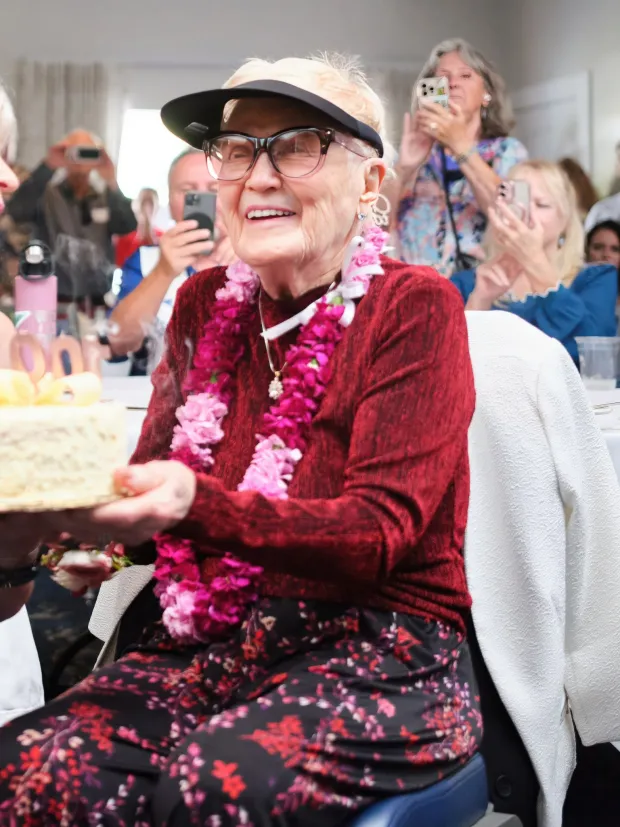 Elaine LaLanne celebrates her century birthday with a coconut chiffon layer cake surrounded by family and friends at her California home on March 19, 2026. (Photo courtesy of LaLanne Family)