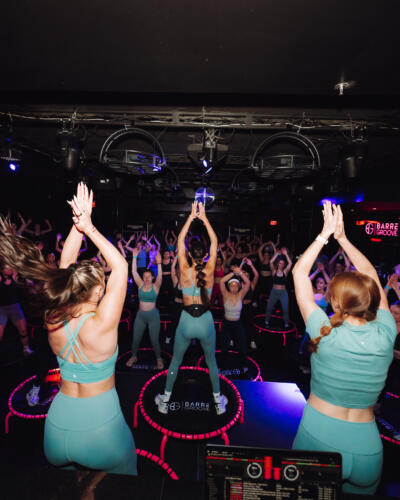 Barre Groove owner Alanna Perry, center, teaches her signature trampoline "twerkout" practice at Bijou nightclub. (Courtesy of Alyssa Pascucci)