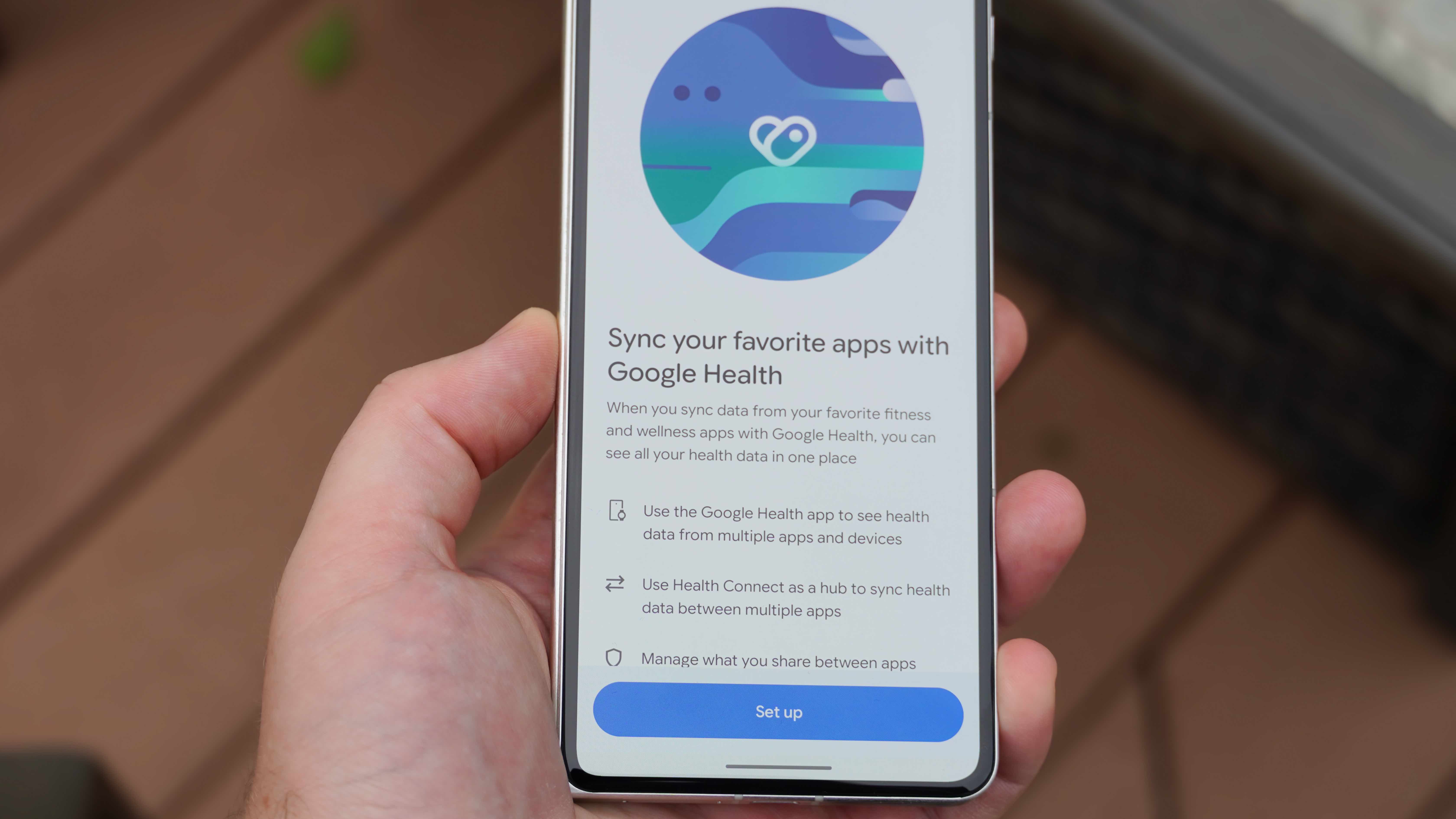 Fitbit Air and Google Health app settings on the lavender band.