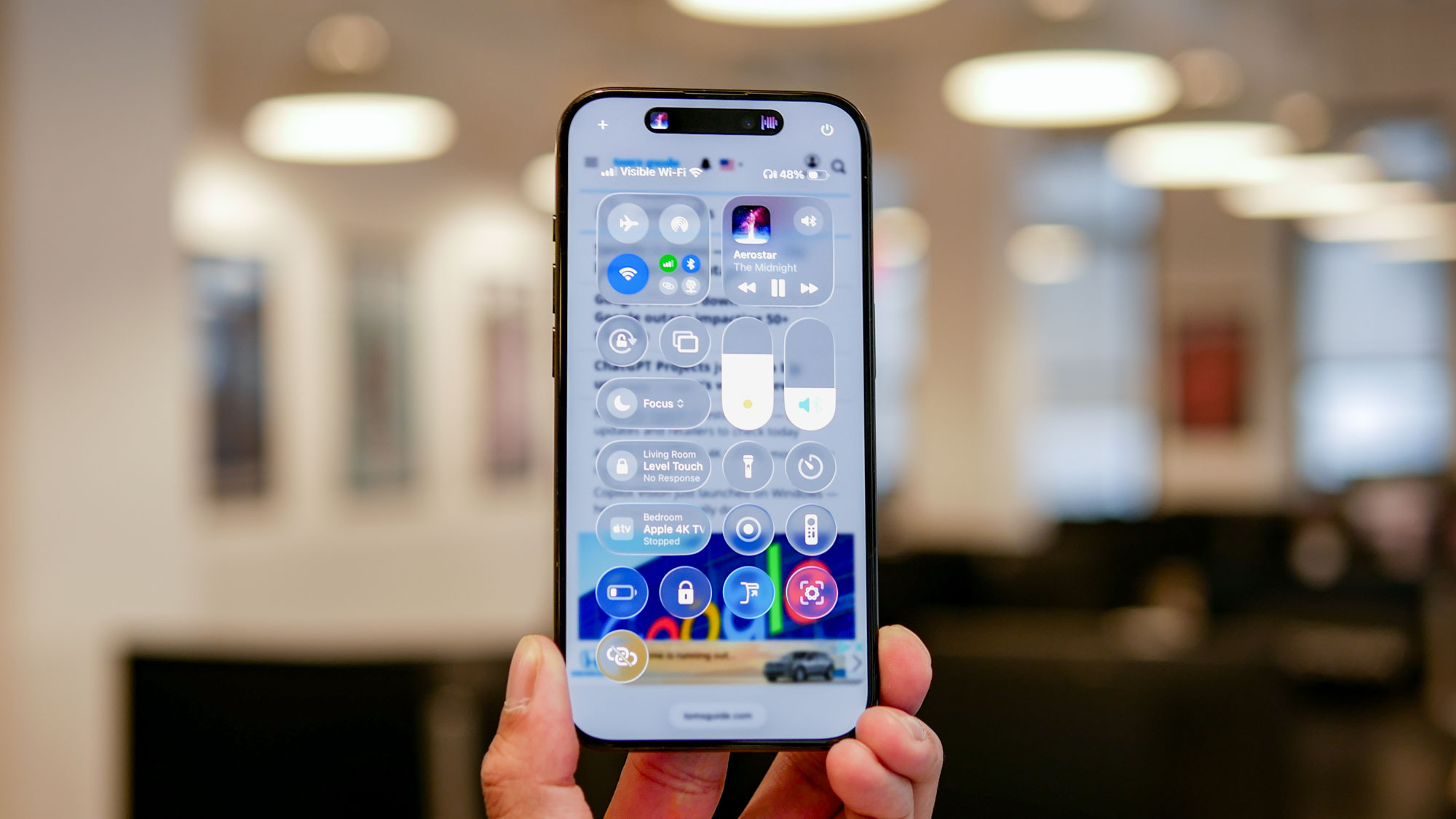 The iOS 26 developer beta running on an iPhone shows off the Liquid Glass interface.