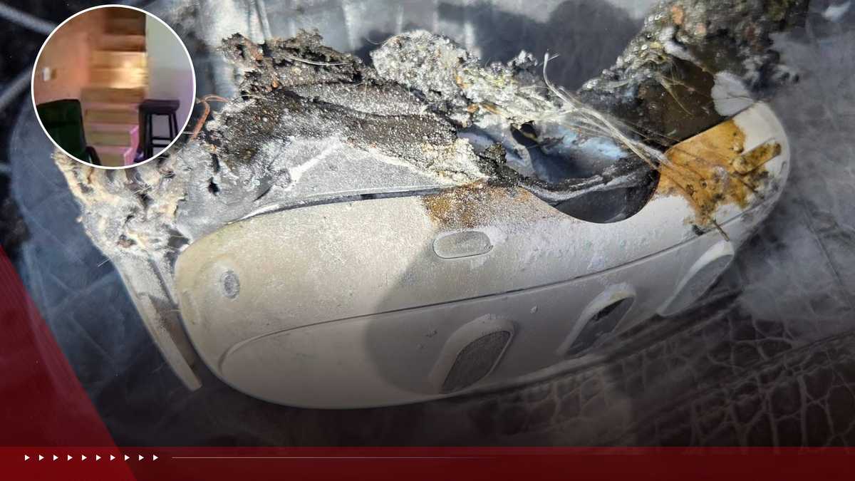 The video shows a burning piece of an exploded VR headset falling down a flight of stairs
